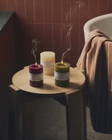 Atlas Files — candles on a side table