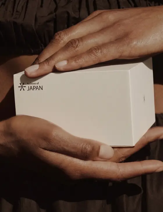 The Archives of Japan box in two hands