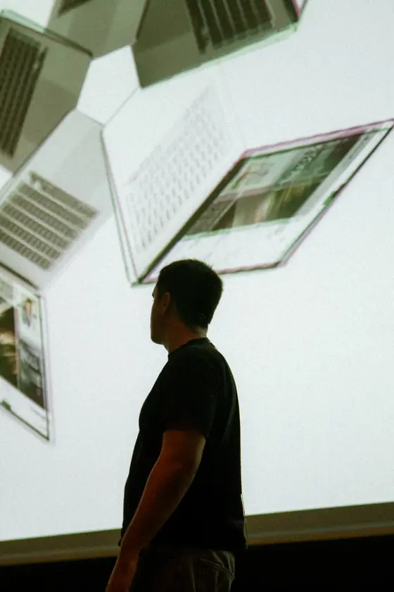 Someone reading a wall of screens