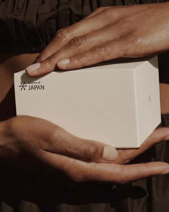 Atlas Files — box held in both hands
